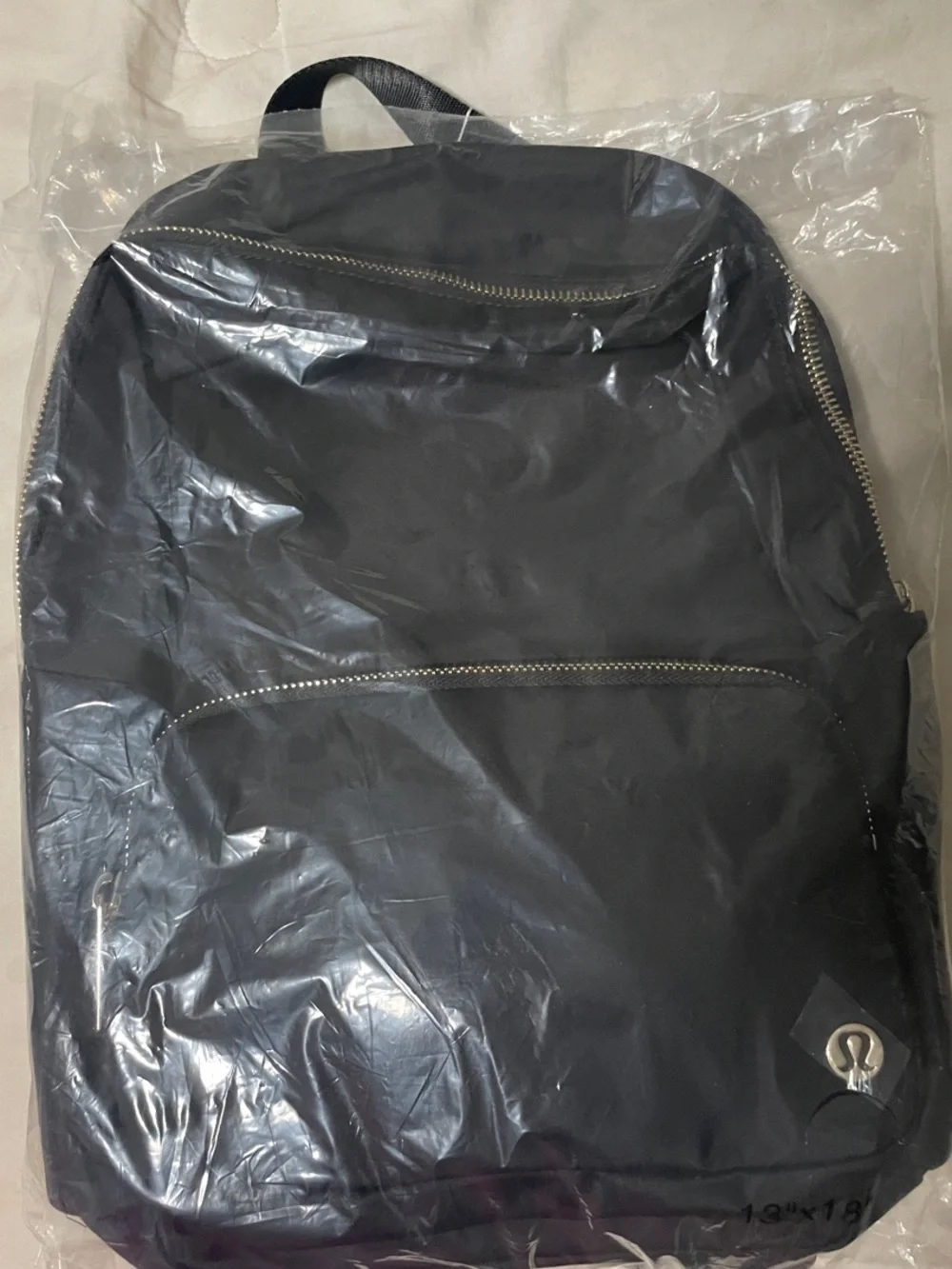 Classic Black Women's Backpack with Front Zip Pocket